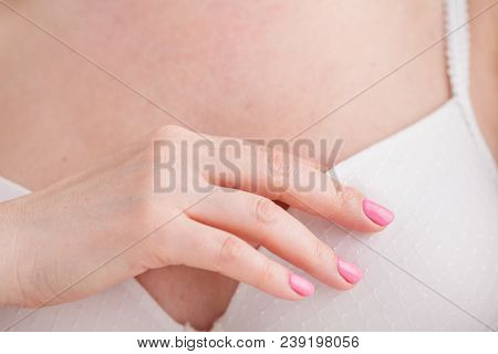 Woman Wearing A Bra Checking Her Breast, Breast Self-exam (bse), How Do I Check Breast Concept, Brea