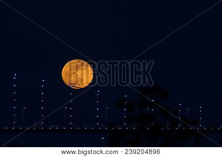 Super Blue Blood Moon Behind Bosphorus Bridge In Istanbul City, Turkey