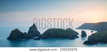 Beautiful Colorful Sunset Landscape Image Of Kynance Cove On South Cornwall Coast Of England
