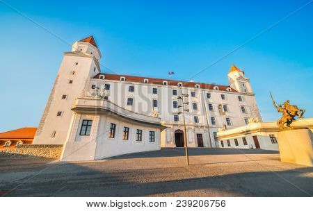 Bratislava Castle Or Bratislavsky Hrad At Sunset. The Main Castle Of Capital City Of Slovakia.