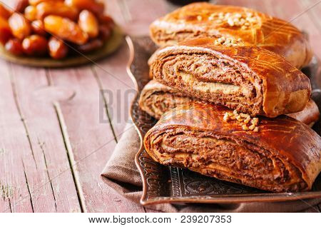 Traditional Turkish Pastry Roll With Chocolate And Nuts Filling - Pastich Served On A Vintage Tray A
