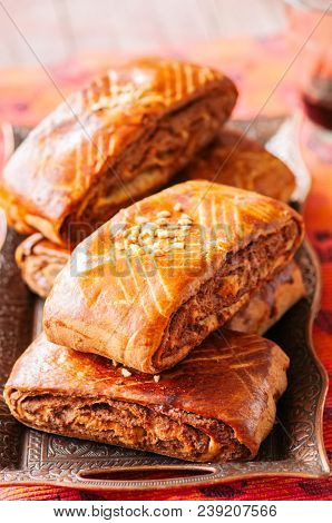Traditional Turkish Pastry Roll With Chocolate And Nuts Filling - Pastich Served On A Vintage Tray.