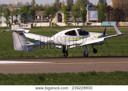 Kiev, Ukraine - April 25, 2014: Diamond Da42 Twin Star Business Aircraft Landing On The Runway Of Ki