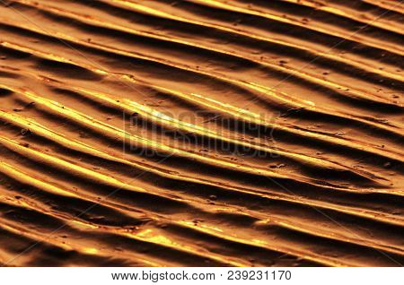 An Abstract Background Of Muddy Ripples With Sunlight Reflecting Off Of Them At Low Tide At Can Gio 