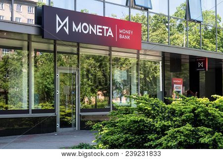 Ostrava, Czech Republic - May 5, 2018: Entrance To The Building Of Moneta Money Bank With Reflection