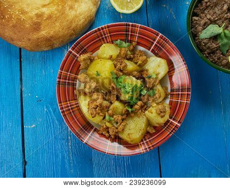 Pakistani Cuisine , Aalo Ki Bhujia, Pickled Potatoes Curry,  Traditional Assorted Dishes, Top View.