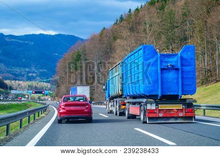 Red Car Overtaking Blue Truck On Highway, Highway Traffic, Road Transportation
