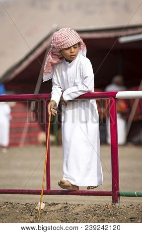 Ibri, Oman, 28th April 2018: Omani Kid At The Races With His Dad