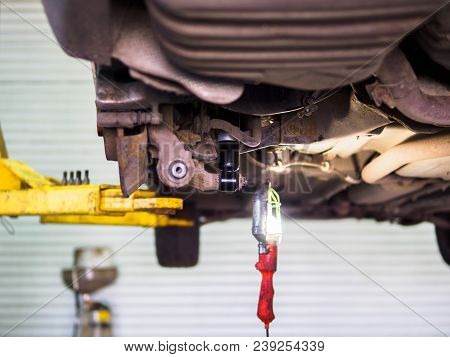 Bottom View Of Car With New Shock Absorbers For Rear Wheels