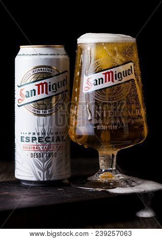London, Uk - May 03, 2018: Aluminium Tin And Original Glass Of San Miguel Lager Beer On Top Of Woode