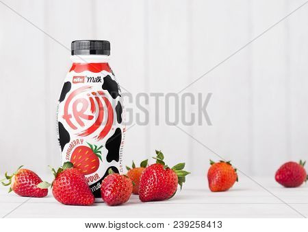 London, Uk - May 03, 2018: Plastic Bottle Of Muller Strawberry Drink On White.
