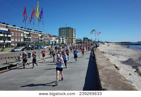 Helsingborg, Sweden - 05 May, 2018: People running competition along the coast of Oresund strait. IFK Helsingborg City Run Springtime performs the 38th edition