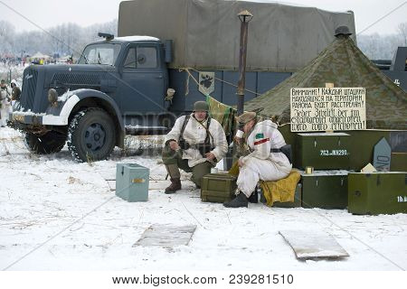 Leningrad Region, Russia - January 14, 2018: German Soldiers In The Field Camp. Fragment Of The Mili