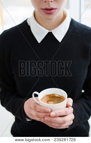 Energy Drink. Coffee Addiction. Modern Lifestyle. Woman Holding A Cup Of Hot Invigorating Beverage
