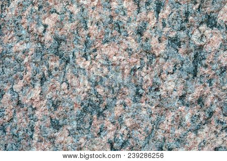 Granite Stone Crystal Texture. The Macro Shot Is Made By Means Of Stacking Technology