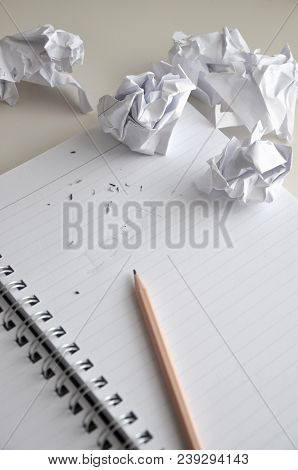 Pencil Point To Erase Words Idea On Paper With Crumpled Paper Throw Around