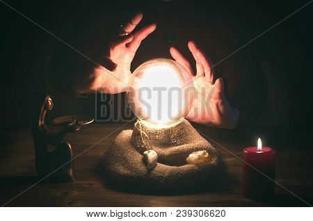 Crystal Ball And Fortune Teller Hands. Divination Concept. The Spiritual Seance. Future Reading.