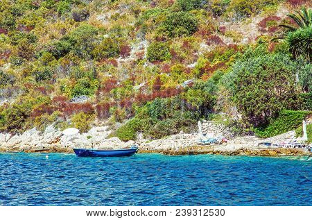 Sea Shore With Little Boat In Maslinica, Solta Island, Croatia. Summer Vacation Destination. Beauty 