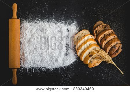 Top View Of Baking Concept , Rolliing With Baking Powder And Bread With