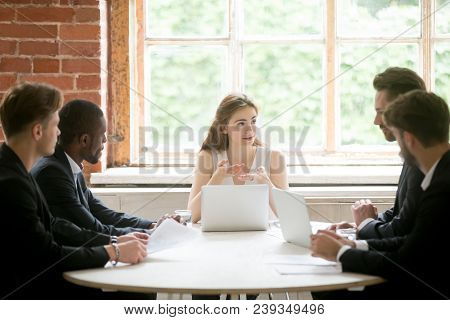 Female Ceo Explaining Company Strategy To Male Colleagues. Work Team Analyzing Financial Rates On Ma