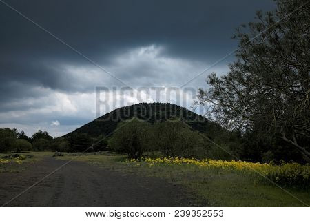 vernal rain cloud on Minardo Mount in Etna Park, Sicily