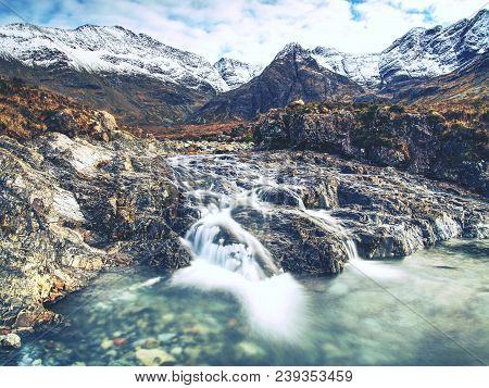 Multiple Waterfalls, Seemingly Vibrant Blue And  Green In Color, With Cold Swimmable Pools. Popolar 