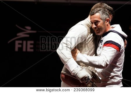 ST. PETERSBURG, RUSSIA - MAY 5, 2018: Maxime Pauty, France accepts congratulations after winning the final of Fencing World Cup Saint-Petersburg Foil. This annual tournament is hold in 44th time
