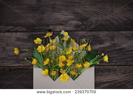Yellow Little Flowers In Envelope Rustic Wooden Background Banner