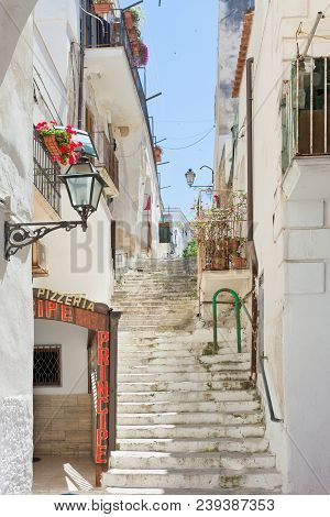 Vieste, Apulia, Italy - May 2017 - Medieval Stairway Through The City Of Vieste
