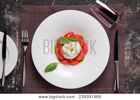 Buratta Cheese With Fresh Tomatoes, Basil And Sauce