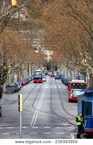 Barcelona, Spain. March 22, 2015: Tram Line. Tree-lined Boulevard Avenue Street In The Historic Cent