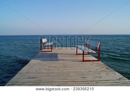 Bench On A Pier Of Burgtiefe Fehmarn Island In Schleswig Holstein Germany