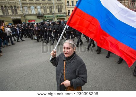 ST. PETERSBURG, RUSSIA - MAY 5, 2018: Opposition supporters on the Nevsky prospect during an opposition protest rally ahead of President Vladimir Putin's inauguration ceremony.