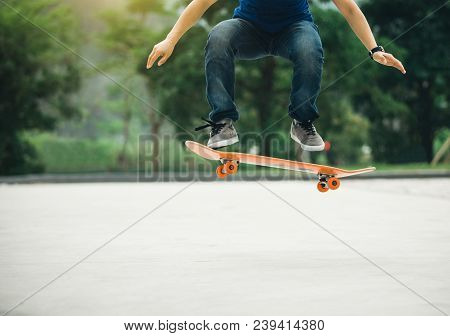 One Young Skateboarder Sakteboarding On Parking Lot