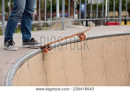 One Young Skateboarder Sakteboarding On Skatepark Ramp