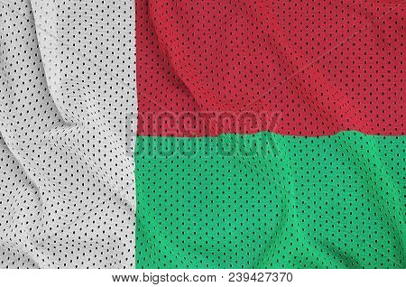 Madagascar Flag Printed On A Polyester Nylon Sportswear Mesh Fabric With Some Folds
