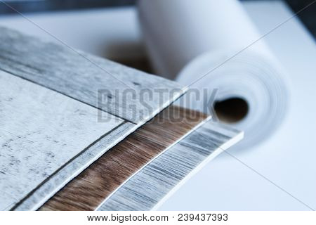 Roll Of Linoleum On A White Background