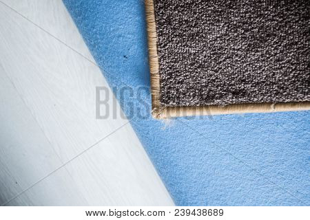 Home Floor Carpet With Overlock On White Laminate.