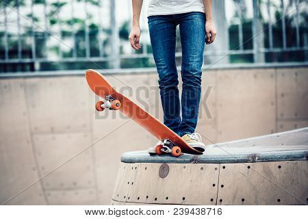 One Young Skateboarder Sakteboarding On Skatepark Ramp