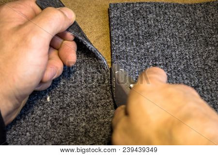 Gray Carpet Roll Is Frozen And Sliced
