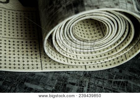 Gray Linoleum Rolled Up, Cut Into Pieces