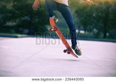 One Young Skateboarder Sakteboarding On Parking Lot