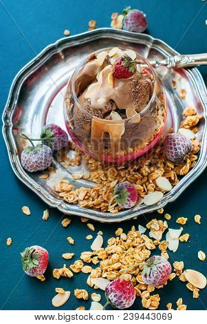 Chocolate Ice Cream Glass Cup Decorated With Strawberry Scattered Muesli Harmful Food Dark Backgroun