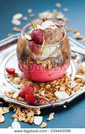 Chocolate Ice Cream Glass Cup Decorated With Strawberry Scattered Muesli Harmful Food Dark Backgroun