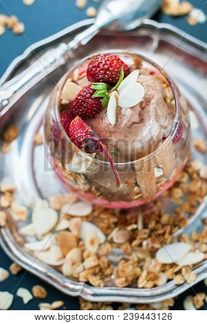 Chocolate Ice Cream Glass Cup Decorated With Strawberry Scattered Muesli Harmful Food Dark Backgroun