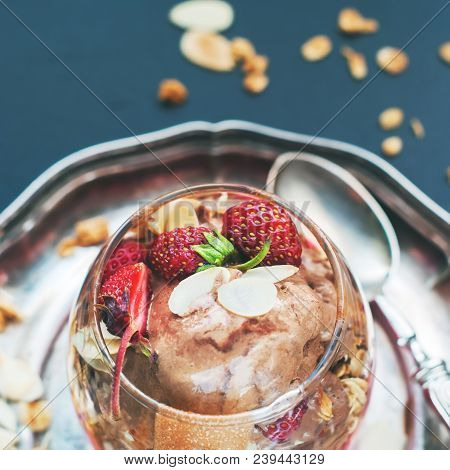 Chocolate Ice Cream Glass Cup Decorated With Strawberry Scattered Muesli Harmful Food Dark Backgroun