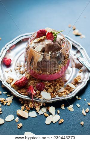 Chocolate Ice Cream Glass Cup Decorated With Strawberry Scattered Muesli Harmful Food Dark Backgroun