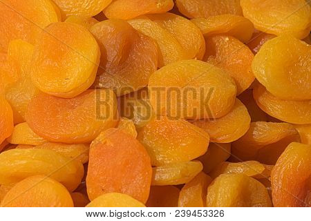 Orange And Yellow Dried Halves Of Apricot Fruits Without Seeds, Dried Apricots And Eastern Sweetness