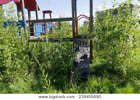 Abandoned Playground With Swing Child Climbing Sunny