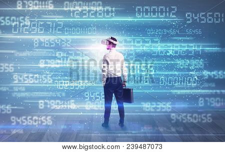 Businessman in vr glasses with variable fast changing numbers around